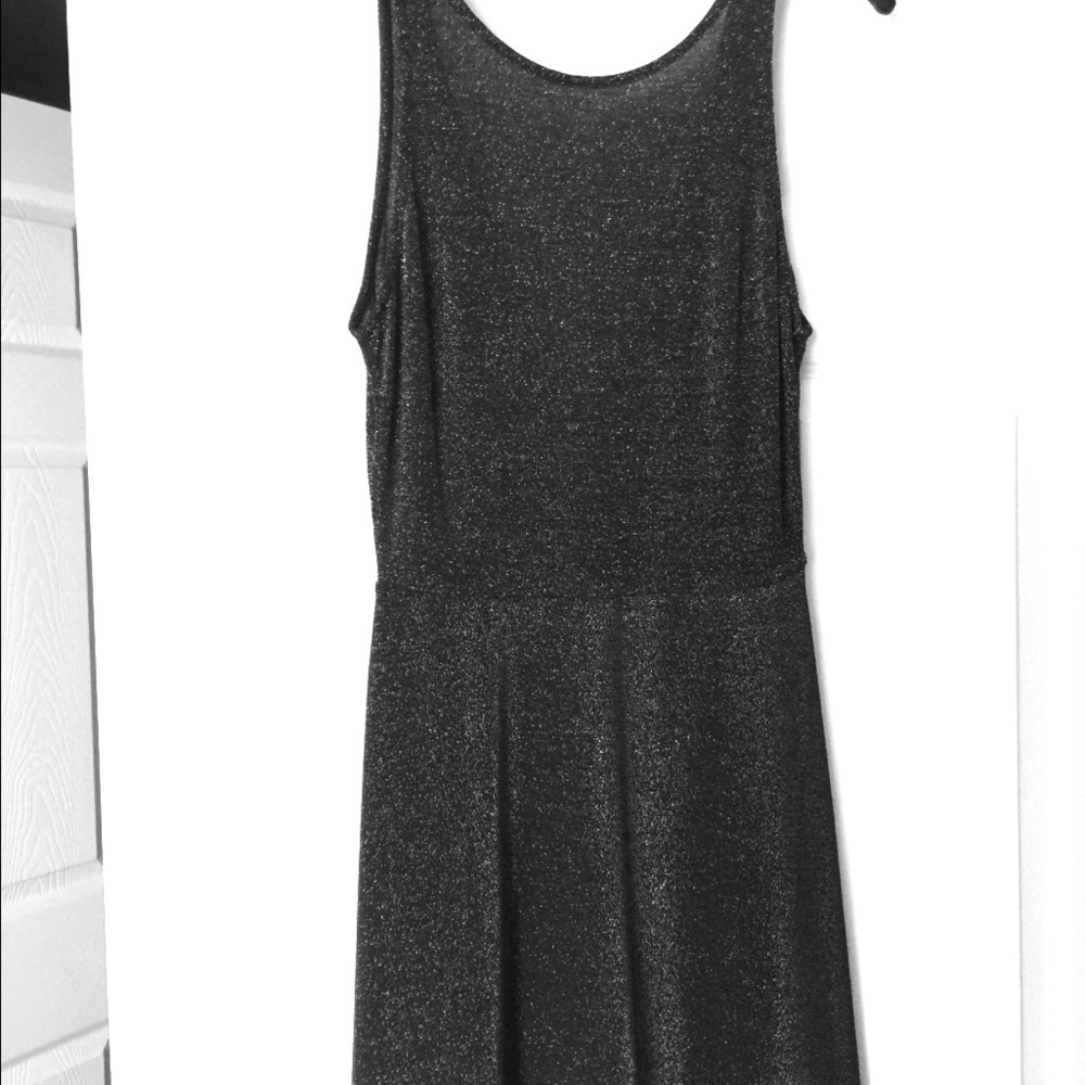 Women’s metallic short black dress, size 6.